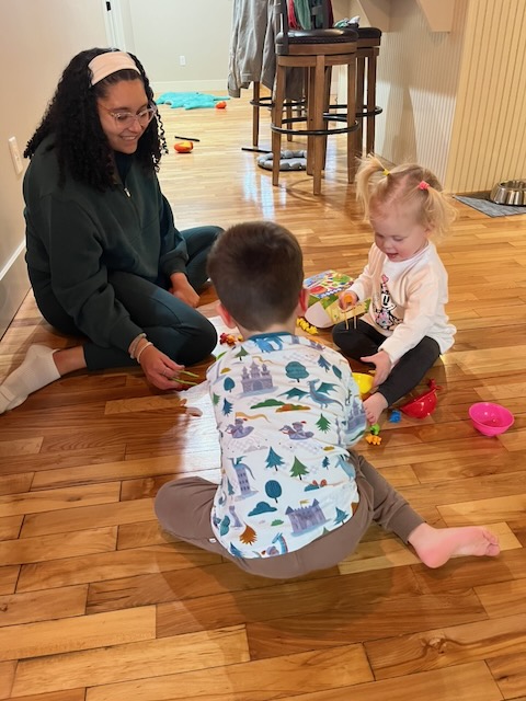 Zoë playing with the kids